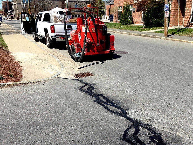 Pin Point Line Striping & Marking - NH Asphalt Crack Sealing